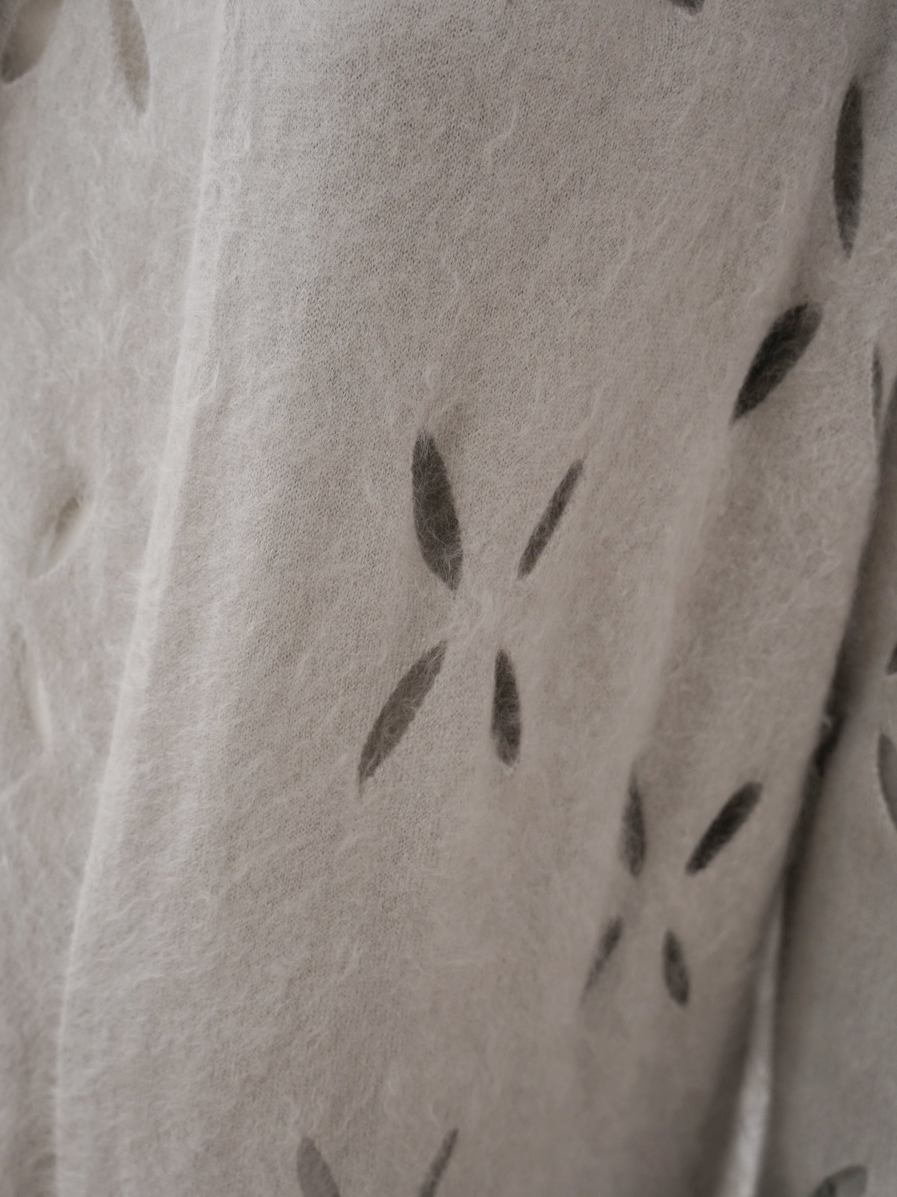 Light grey cashmere knit cover with cutout flowers